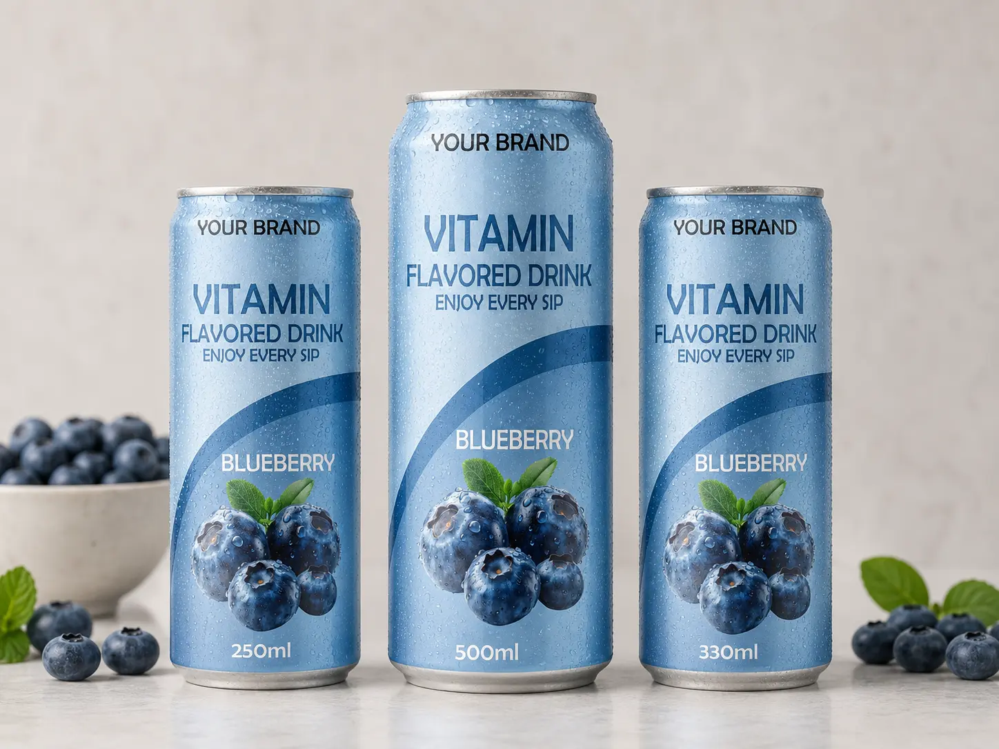 VITAMIN FLAVORED DRINK Blueberry flavour in 250ml, 500ml, and 330ml cans.